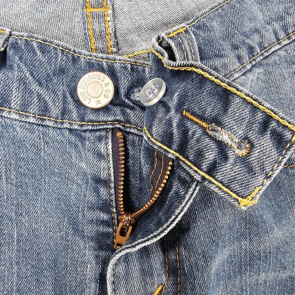 Vintage Levi's 542 Low Rise Flare Jeans Womens 12M Medium Wash Y2K Flap Pocket